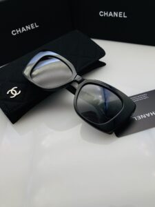 CHANEL Cat Eye Sunglasses for Women, Col.01 Black/Black, Polished Black Acetate Frame with Black Crystal Embellished CHANEL Letter Logo, UV400 Protection Grey Lenses