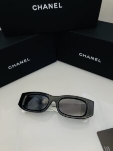 CHANEL CH5493 Col.01 Narrow Rectangular Sunglasses for Women, Polished Black Acetate Frame with White Temples & Silver Interlocking CC Logo, Polarized UV400 Protection Grey Lenses, 53mm